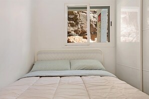 2 dormitorios, tabla de planchar con plancha, wifi gratis y ropa de cama