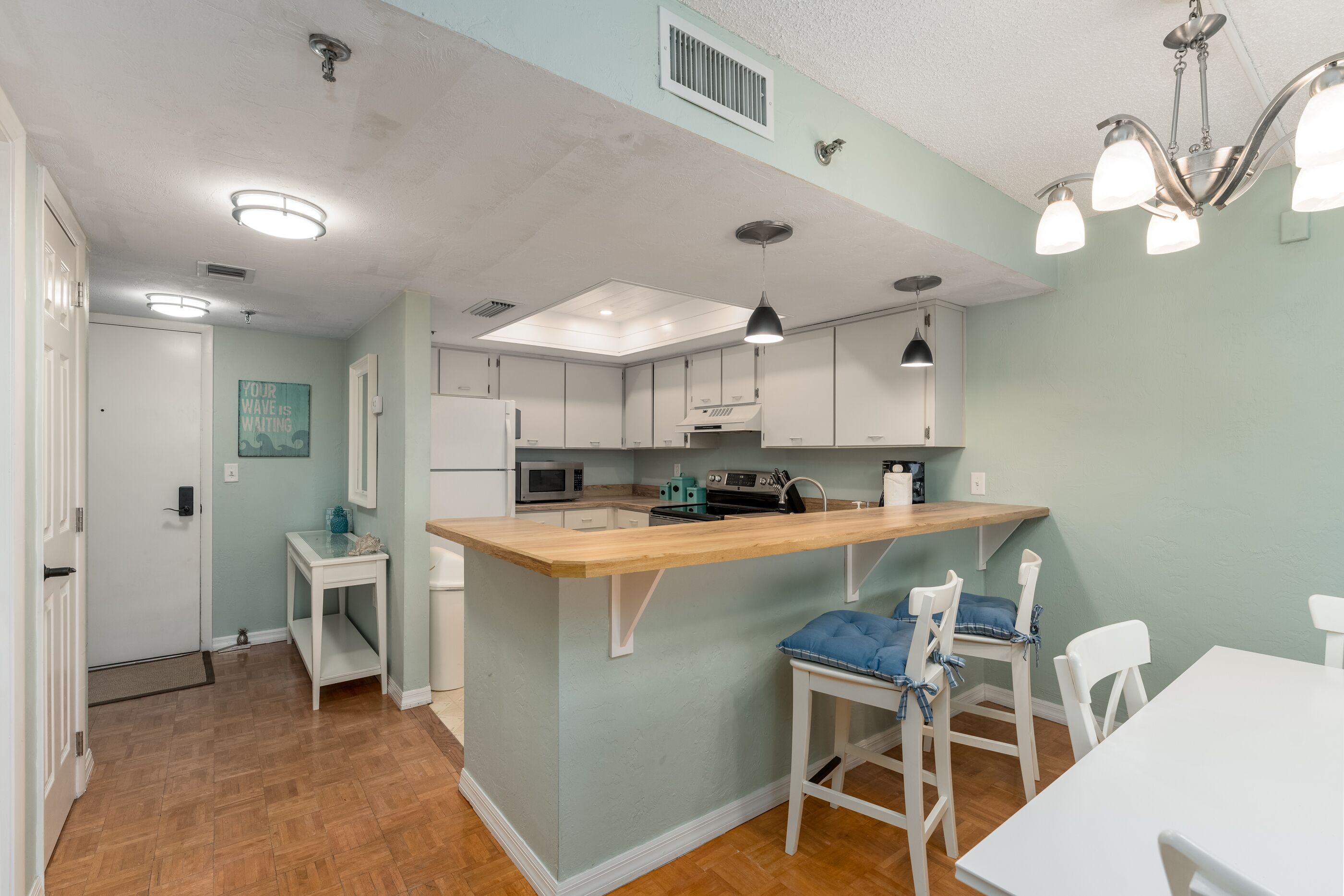 Beach views with top complex amenities and covered parking!