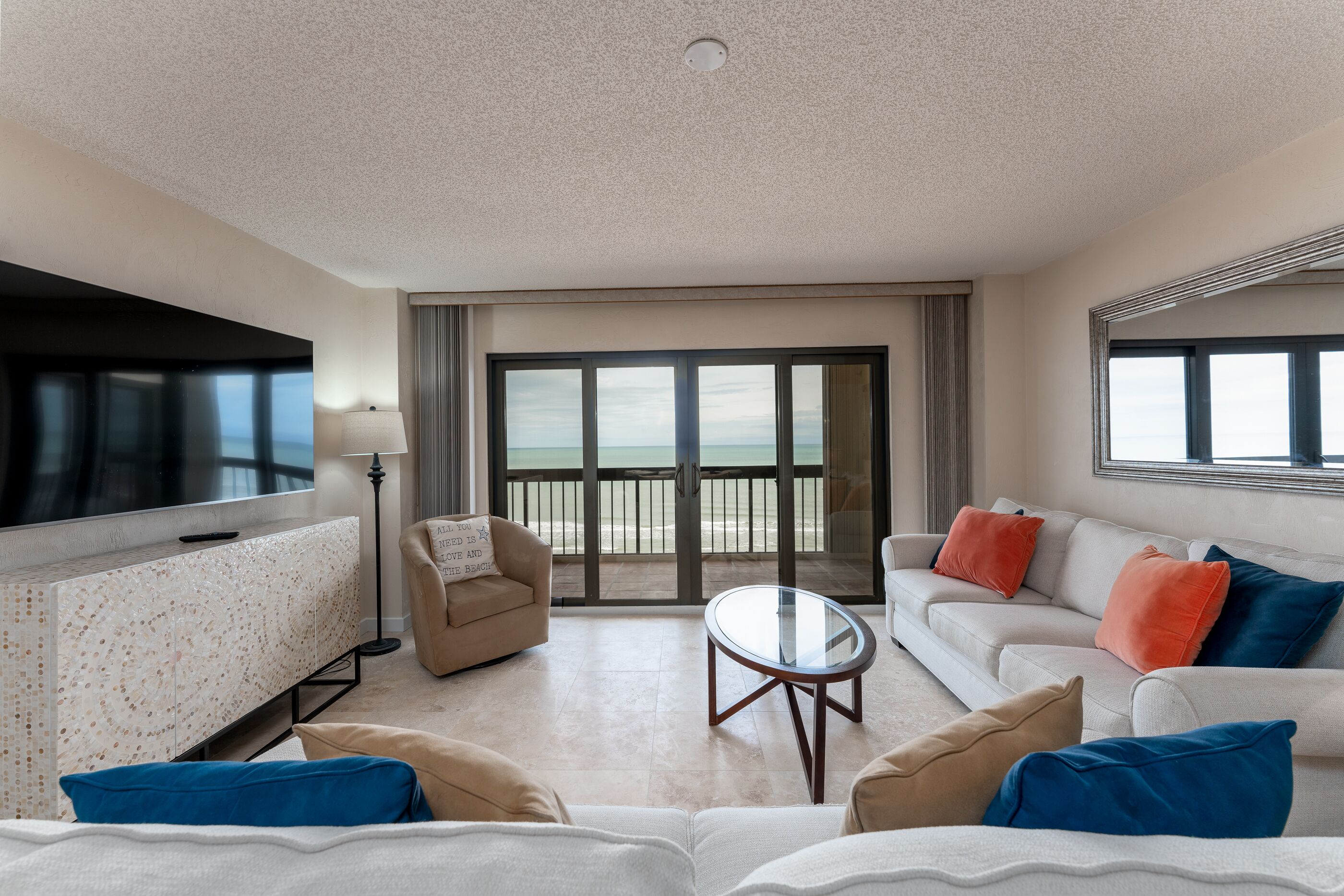 Coastal condo with direct oceanfront views and pool access!