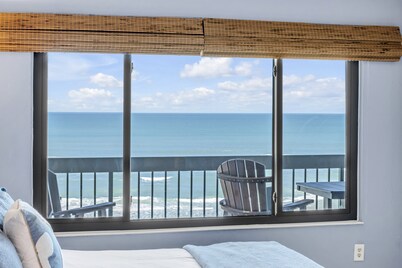 Direct oceanfront corner condo with big balcony, heated beachfront pool and garage parking