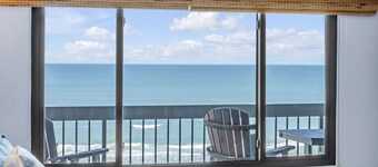 Direct oceanfront corner condo with big balcony, heated beachfront pool and garage parking