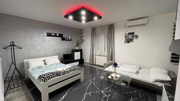 Deluxe Studio | Hypo-allergenic bedding, memory foam beds, desk, soundproofing