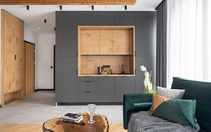 Suite | Tabla de planchar con plancha, wifi gratis, ropa de cama