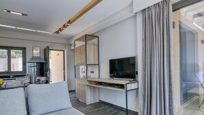 Family House, Multiple Bedrooms, 2 Bathrooms (Serenity Suites Sea View 4) | Living area | TV - Serenity Suites Sea View 4 (Zacharo)