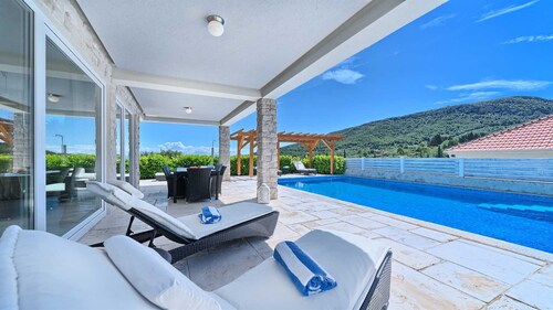 Villa Caprice - with a heated pool and a spa, for 10 guests on Island Hvar by MyWaycation