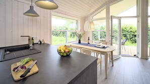 Private kitchen - Holiday home with a Scandinavian flair in a quiet location with covered terrace (Dreschvitz)