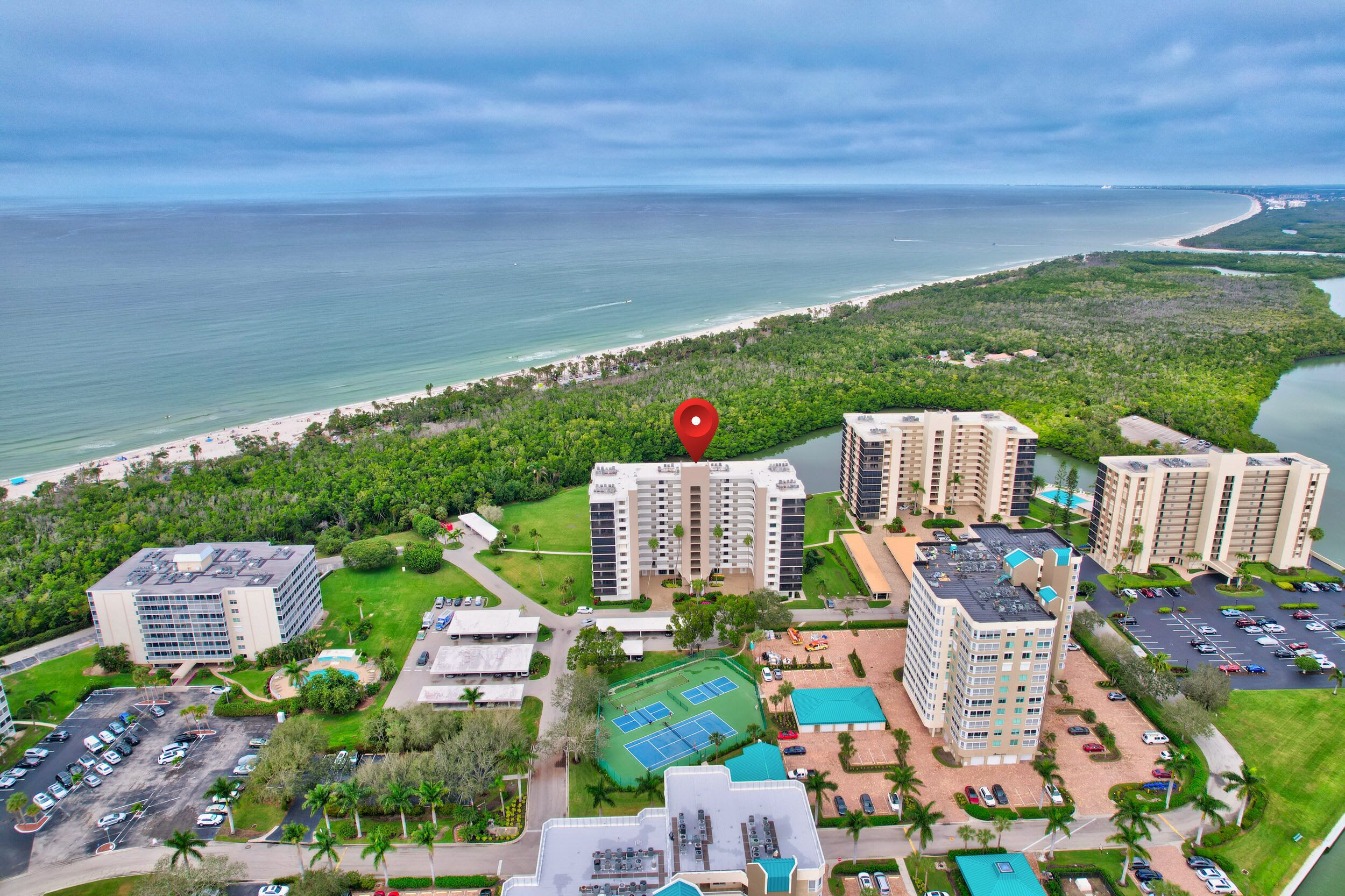 6th Floor End Unit -Bay Side -With Gulf Views and Walk to Vanderbilt Beach!
