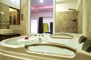 Premium with Hot Tub | Bathroom | Free toiletries, hair dryer, towels