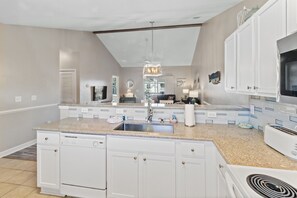 Condo, 2 Bedrooms | Private kitchen | Fridge, oven, coffee/tea maker, toaster