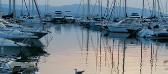 Stay on a charming sailboat at the quayside.