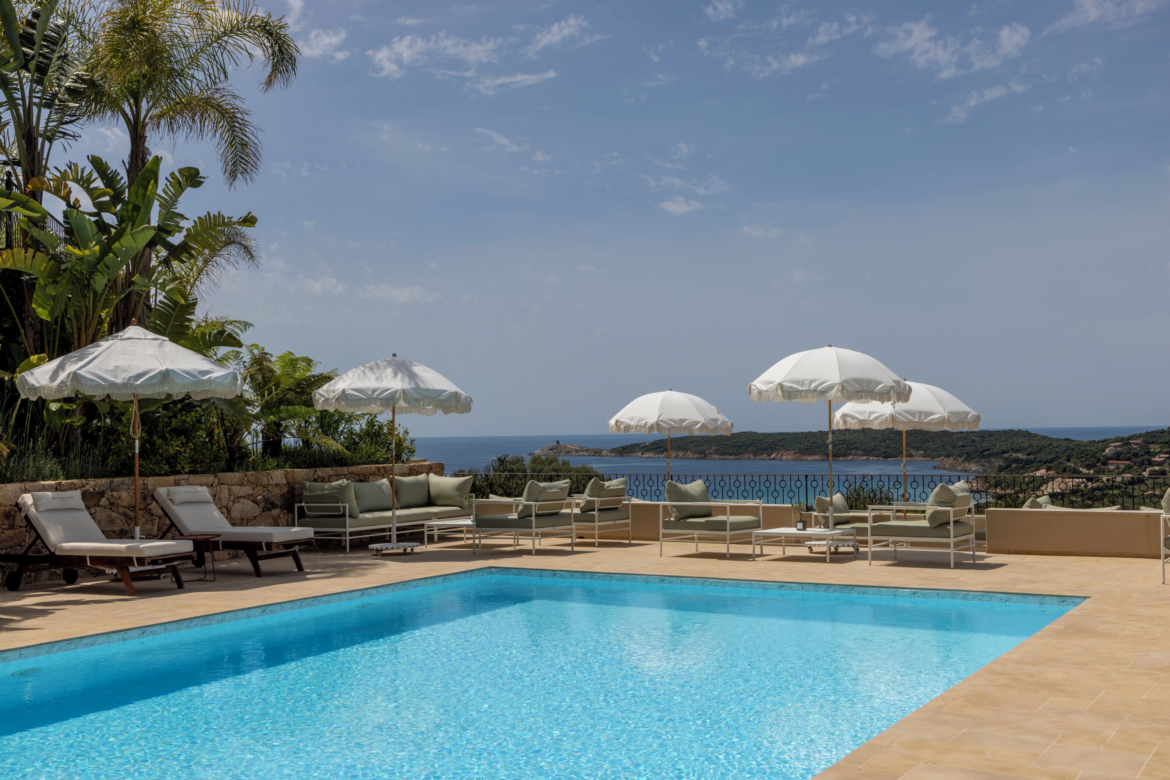 Seasonal outdoor pool, pool umbrellas, pool loungers