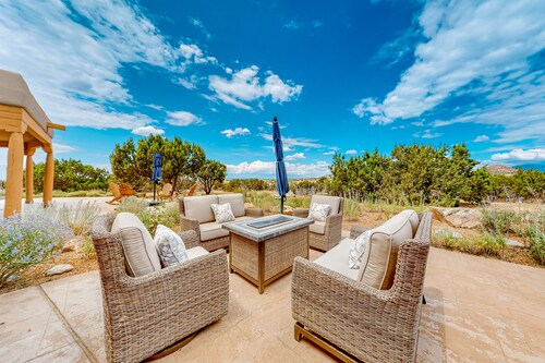 Idyllic mountain-view retreat with luxe interior & private sunset-view hot tub