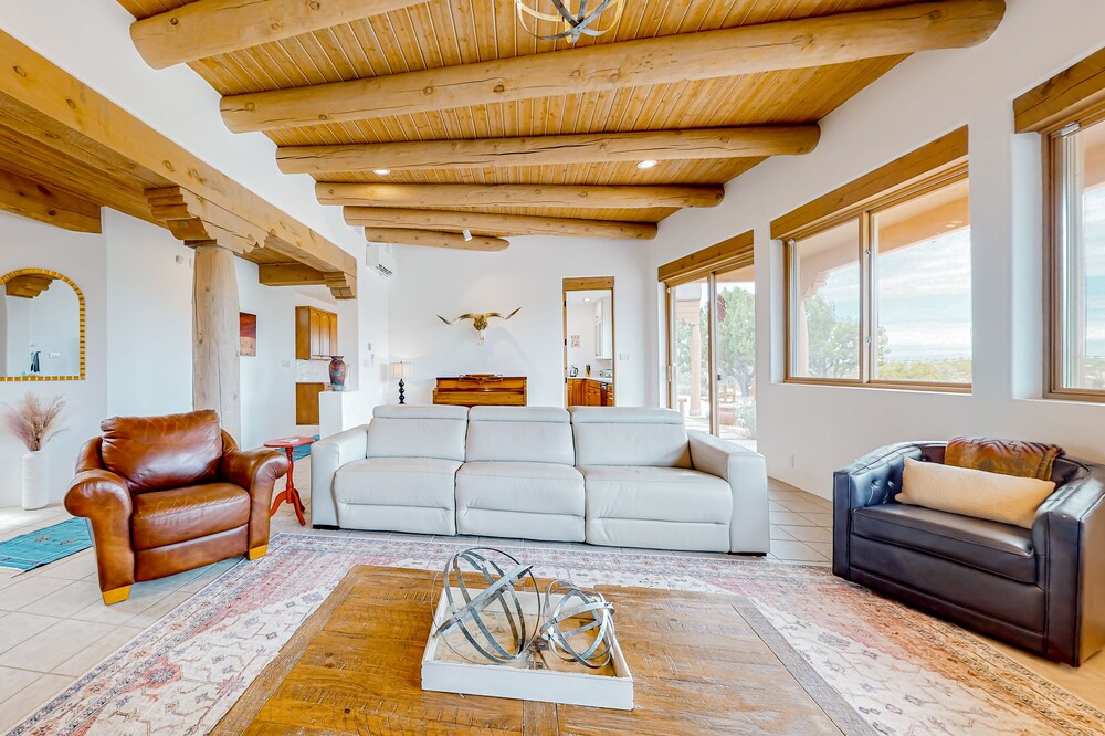 Idyllic mountain-view retreat with luxe interior & private sunset-view hot tub
