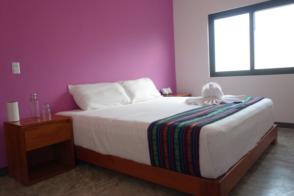 Habitación Confort doble | Ropa de cama de alta calidad y colchones con acolchado adicional