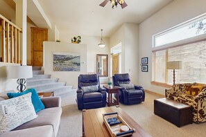 TV, fireplace, books