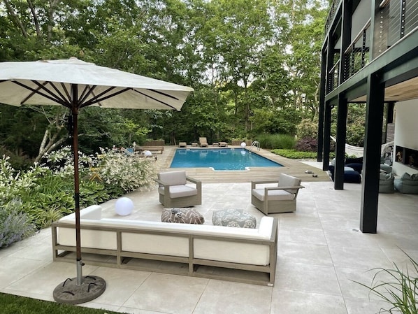 Outdoor pool, a heated pool - Modern secluded woods house with heated pool (East Hampton)