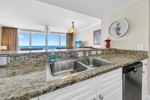 Fridge, microwave, oven, stovetop - 🏝️BeachFRONT-2 POOLS-Fitness Center-Hot Tub-Emerald Beach 1033🏝️ (Panama City Beach)