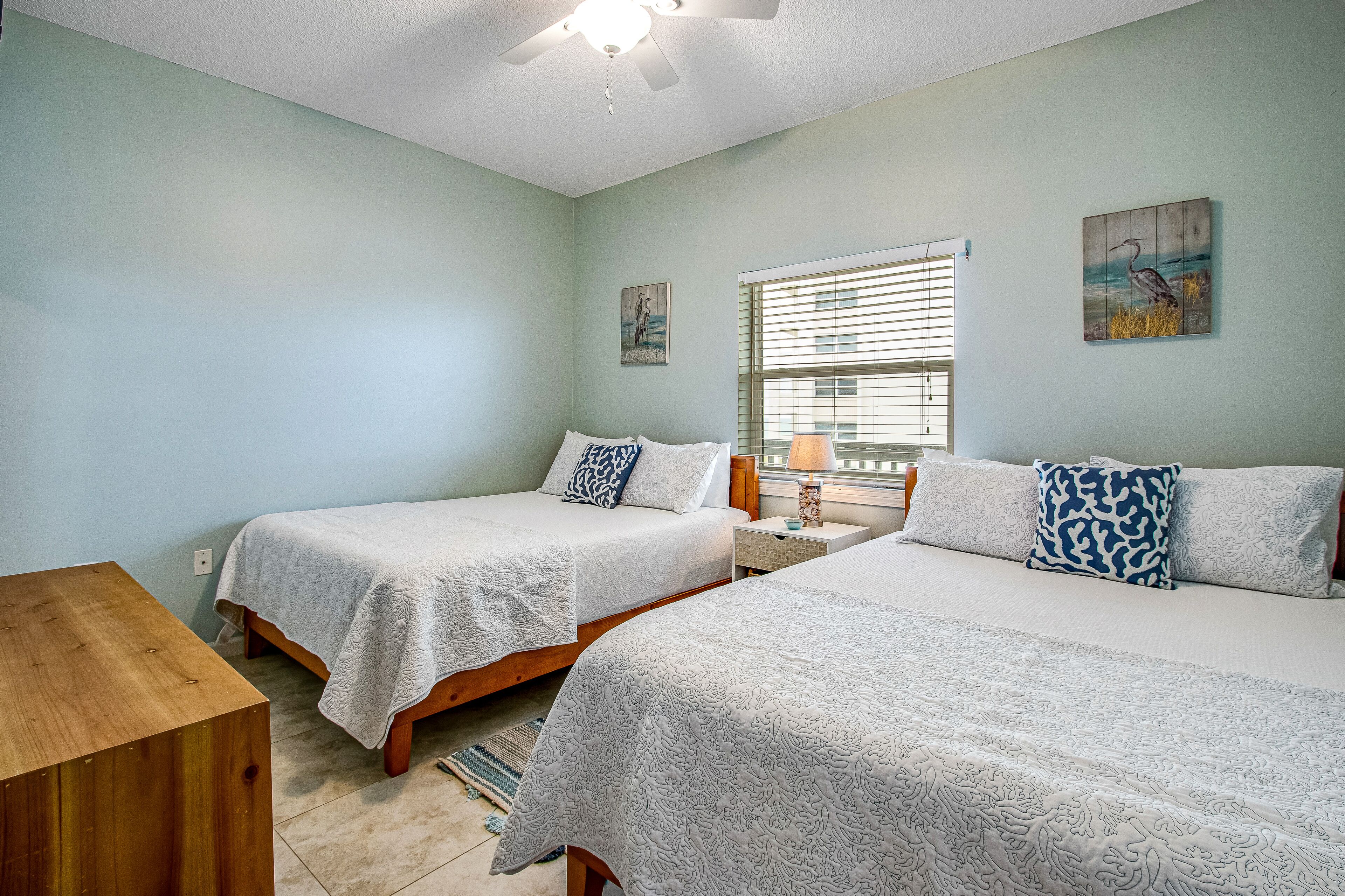 Cozy coastal condo with pool, fast WiFi, central AC, & easy beach access
