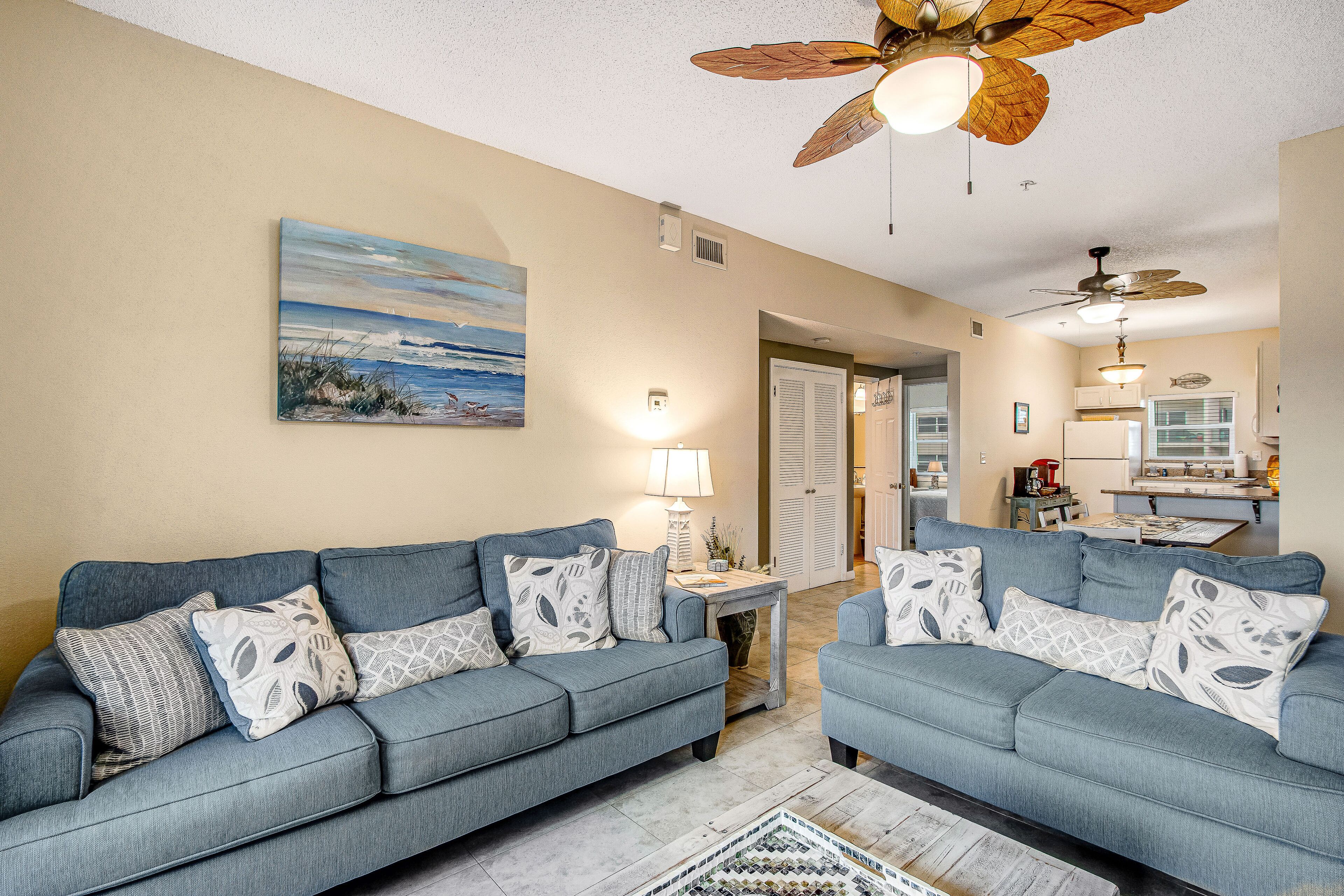 Cozy coastal condo with pool, fast WiFi, central AC, & easy beach access