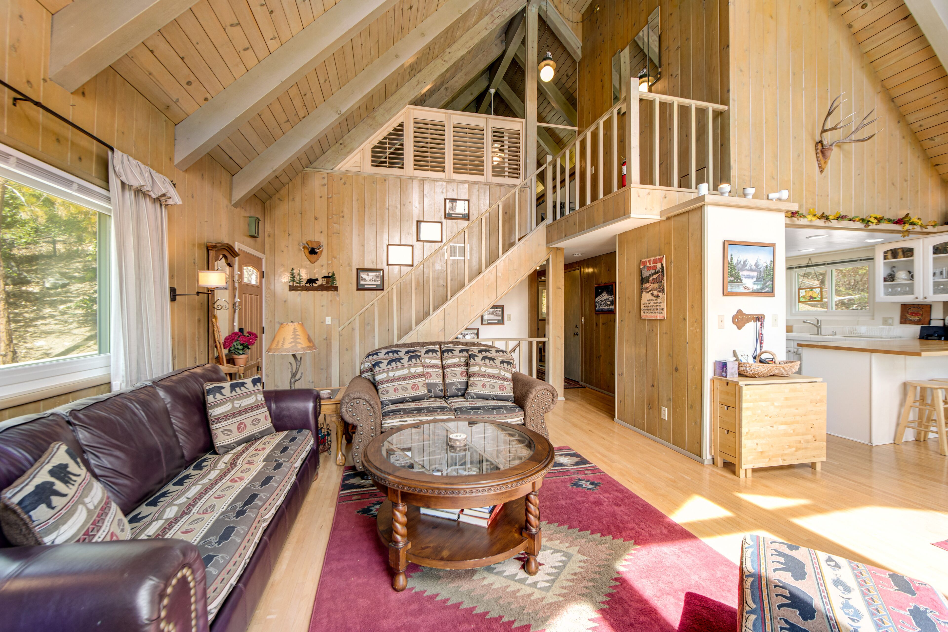 Mountain-view home with fireplace, deck, central AC, game room & washer/dryer