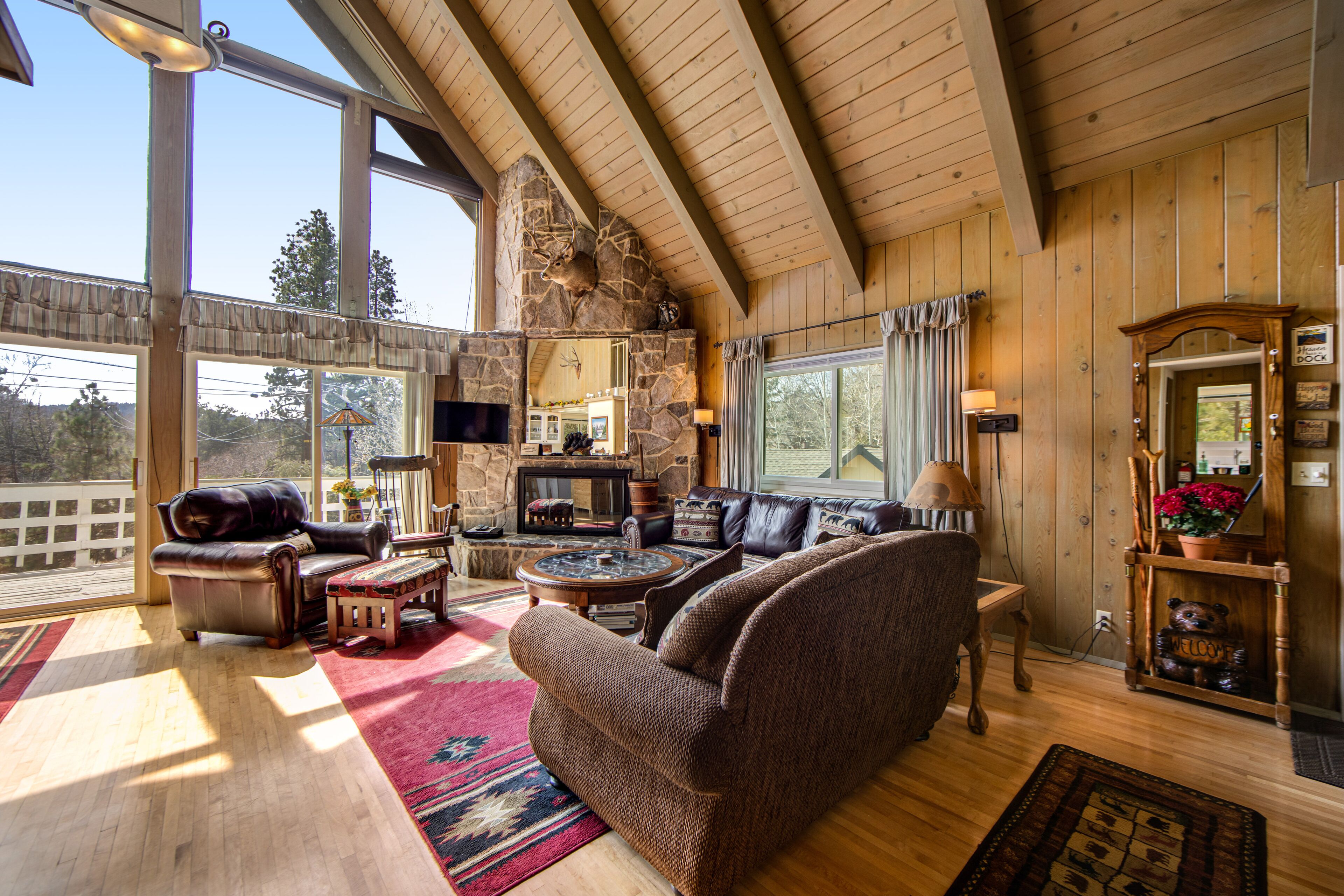 Mountain-view home with fireplace, deck, central AC, game room & washer/dryer