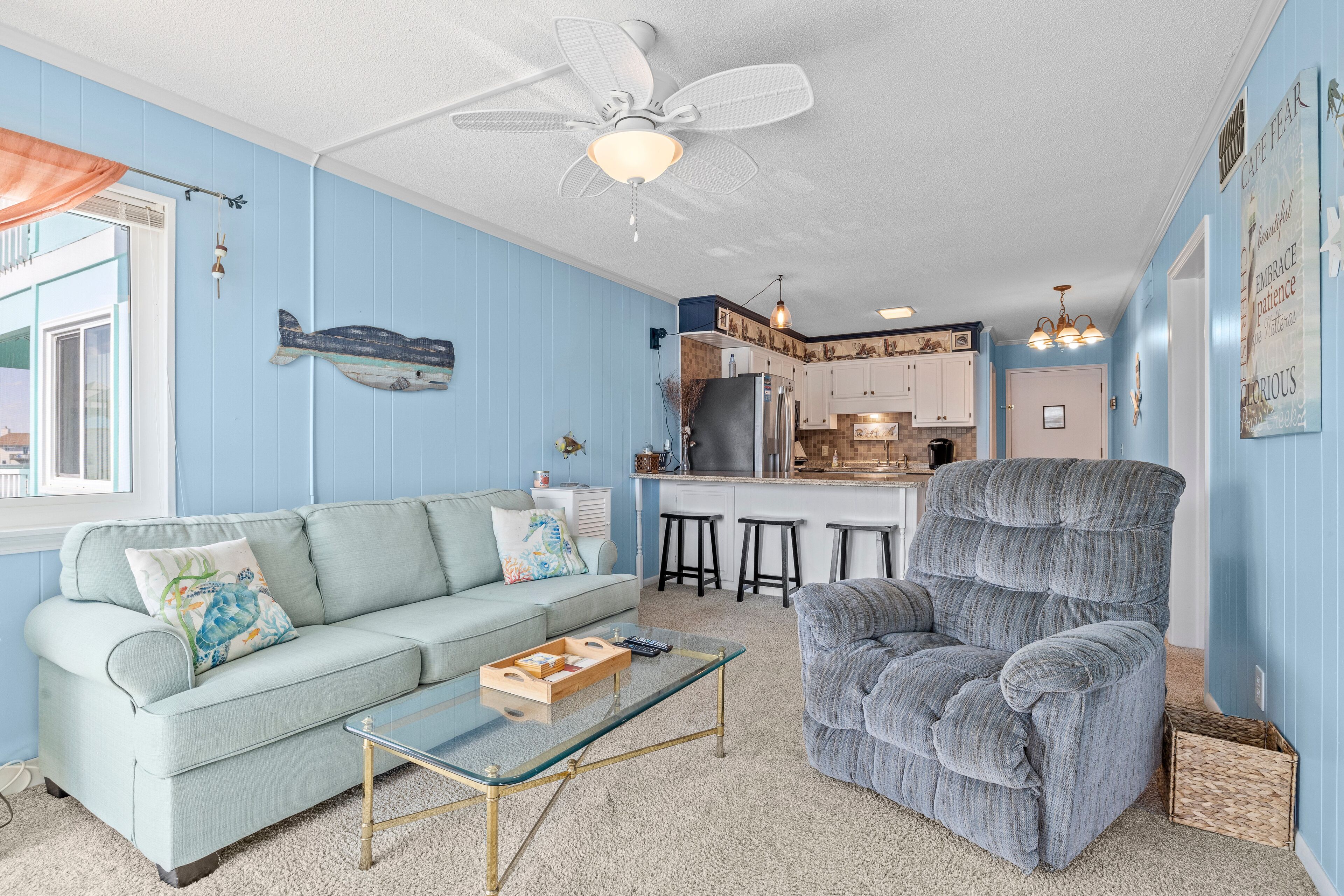 Ocean-view condo with beach access, WiFi, pool, washer/dryer, & AC