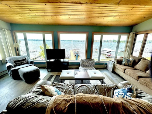 Spacious lakefront home with private dock and a panoramic view of Conneaut Lake.