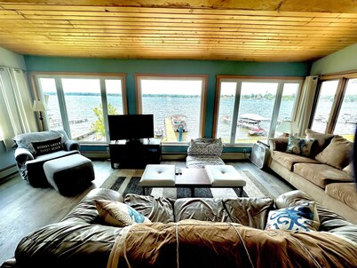 Spacious lakefront home with private dock and a panoramic view of Conneaut Lake.