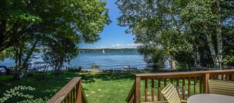 Waterfront home on Portage Lake with lake-view deck & firepit