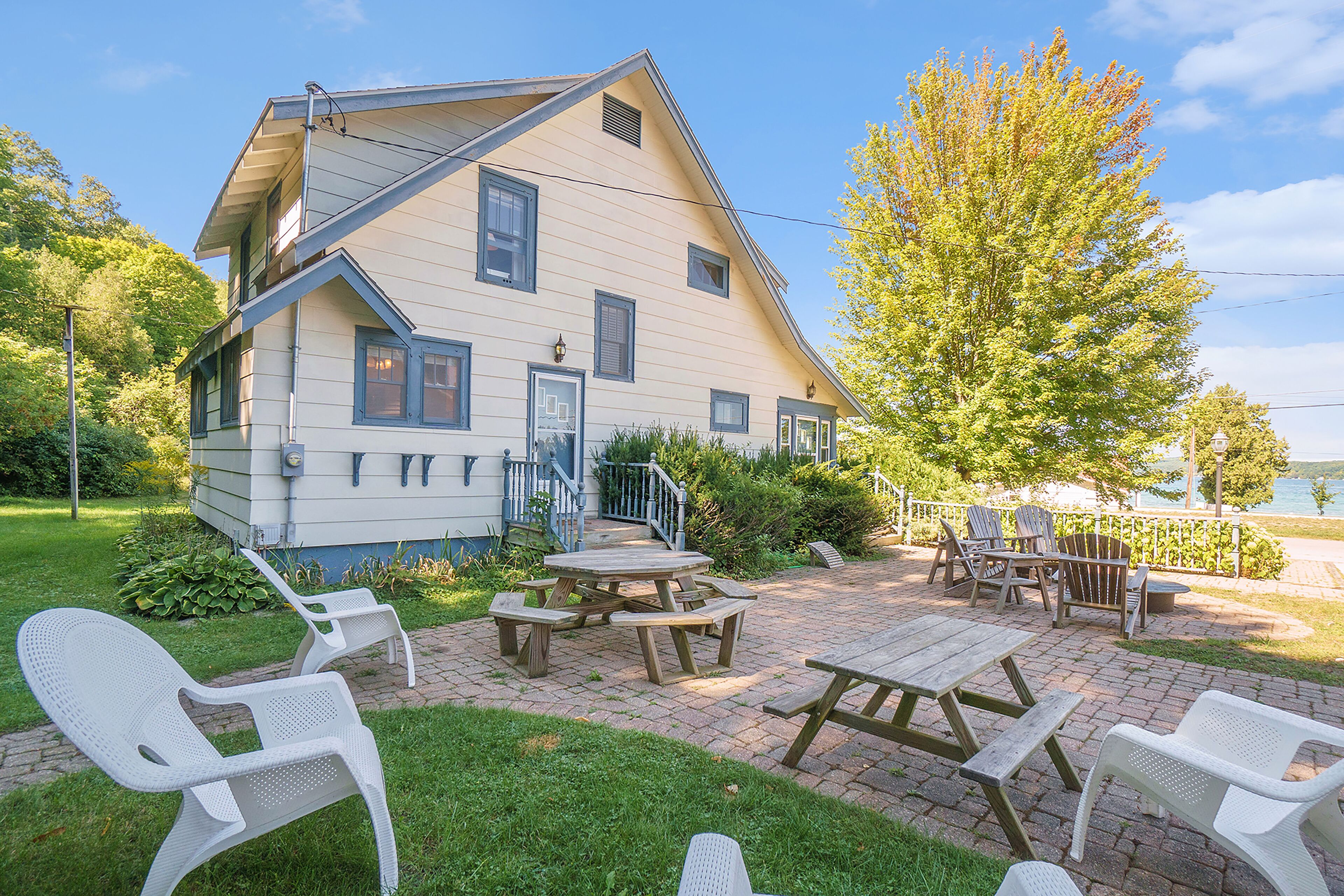 Downtown Beulah home overlooking Crystal Lake w/firepit, adult bikes - dogs OK