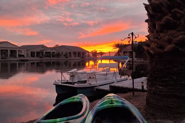 back yard at sunset. 2 kayaks