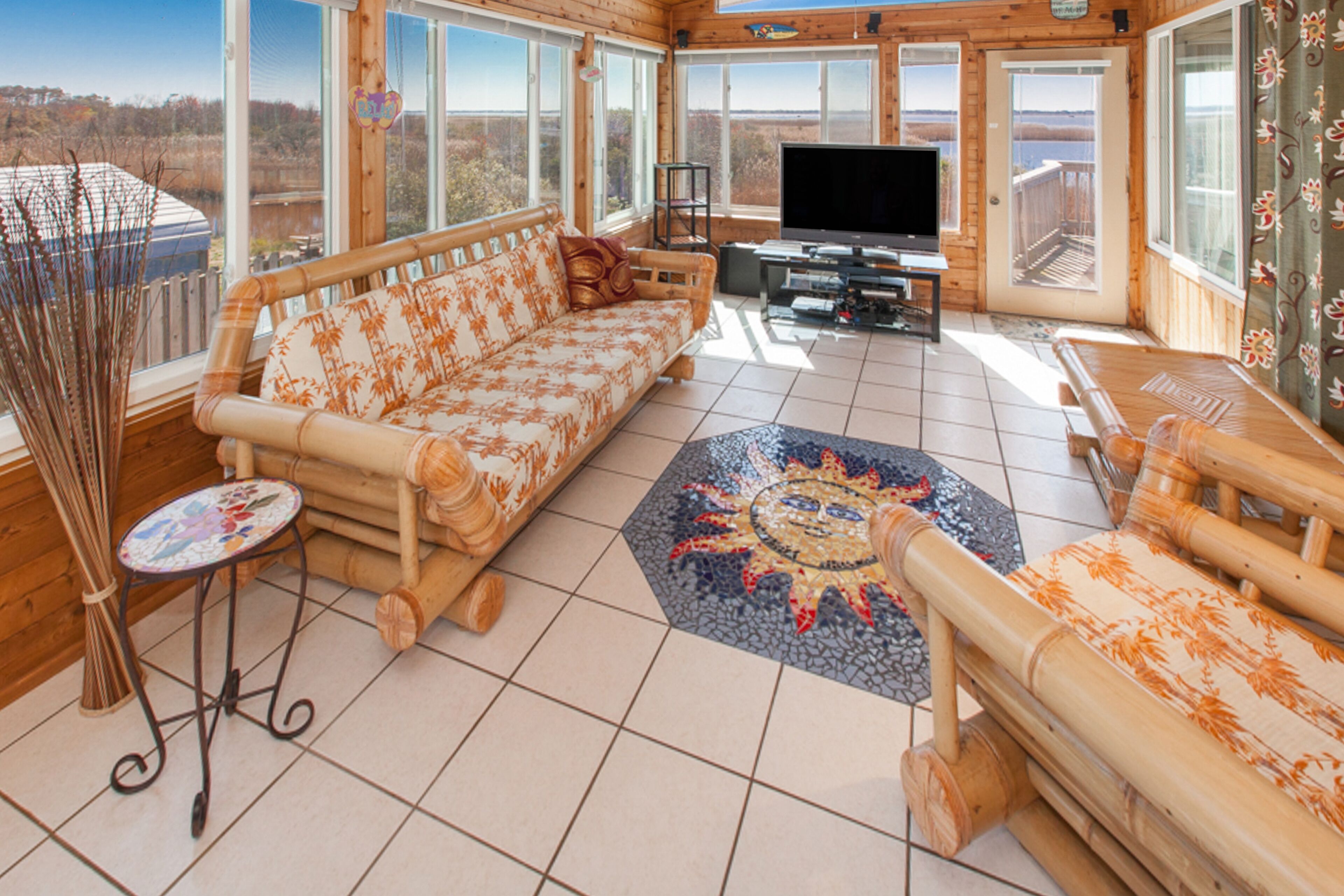 Beach-themed home on Back Bay - private pool, hot tub & sauna - walk to beach