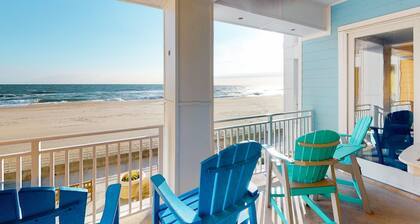 Beachfront condo with 2 oceanfront balconies, W/D, pool, & gym