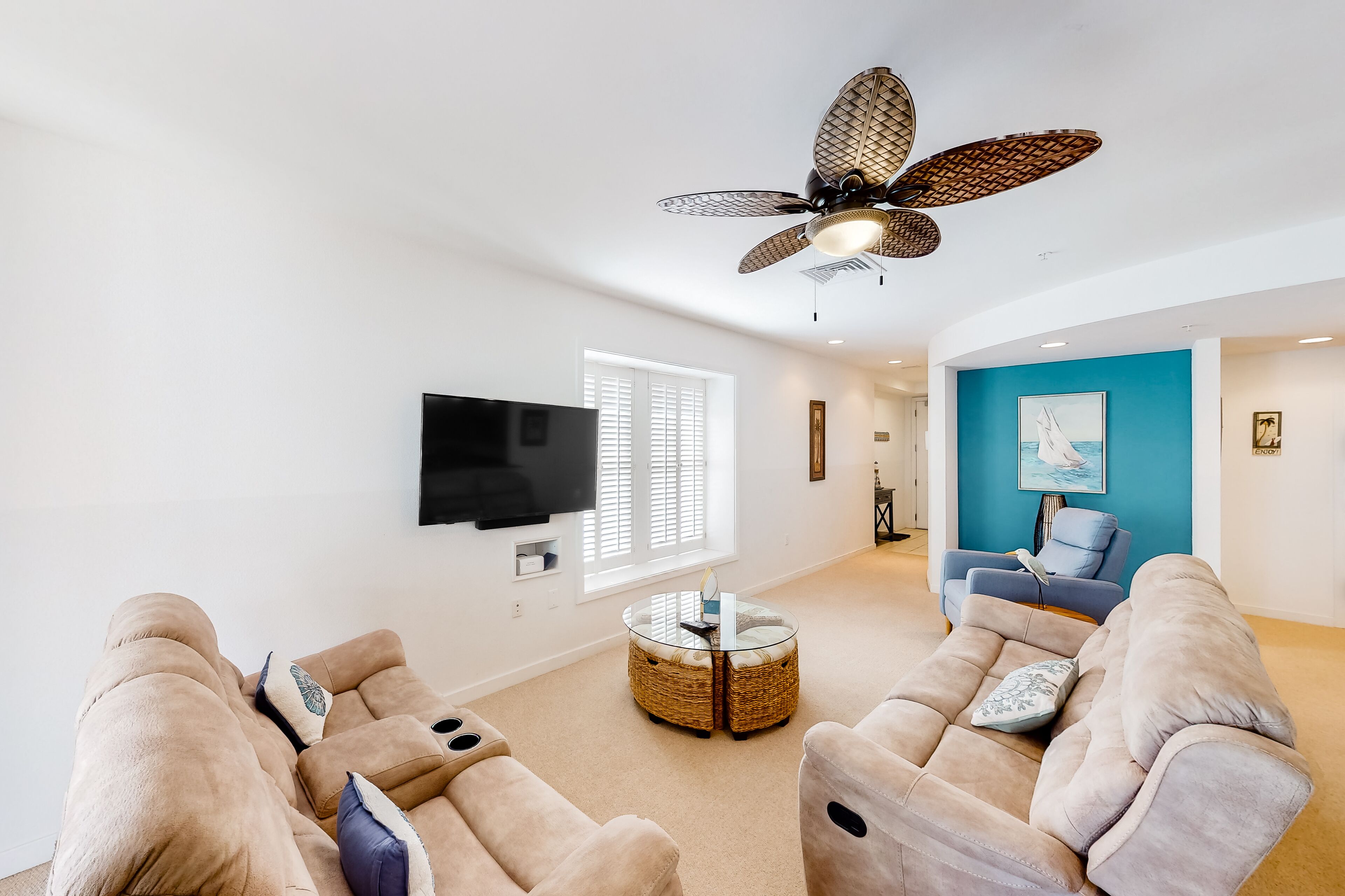 2nd-floor condo with views of the ocean, balcony, on-site outdoor pool, gym & AC