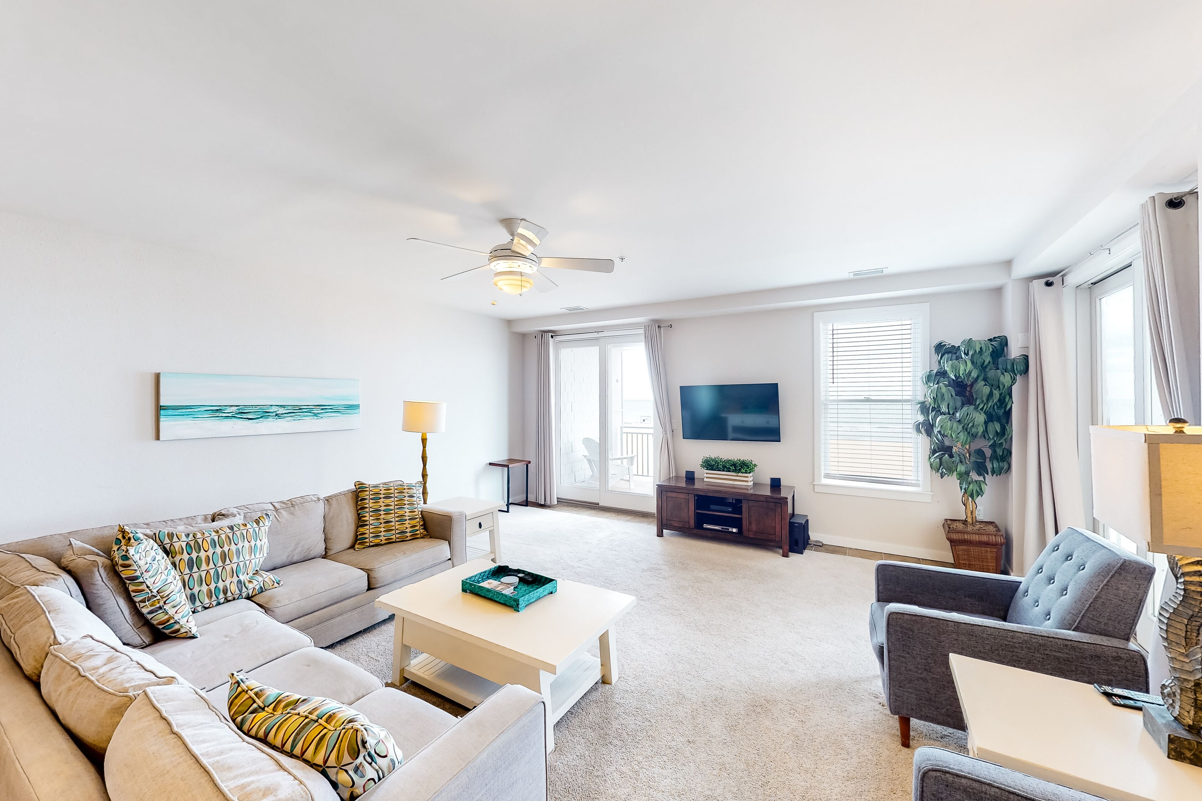 1st-floor oceanfront retreat with private balcony & W/D, beach views & pool