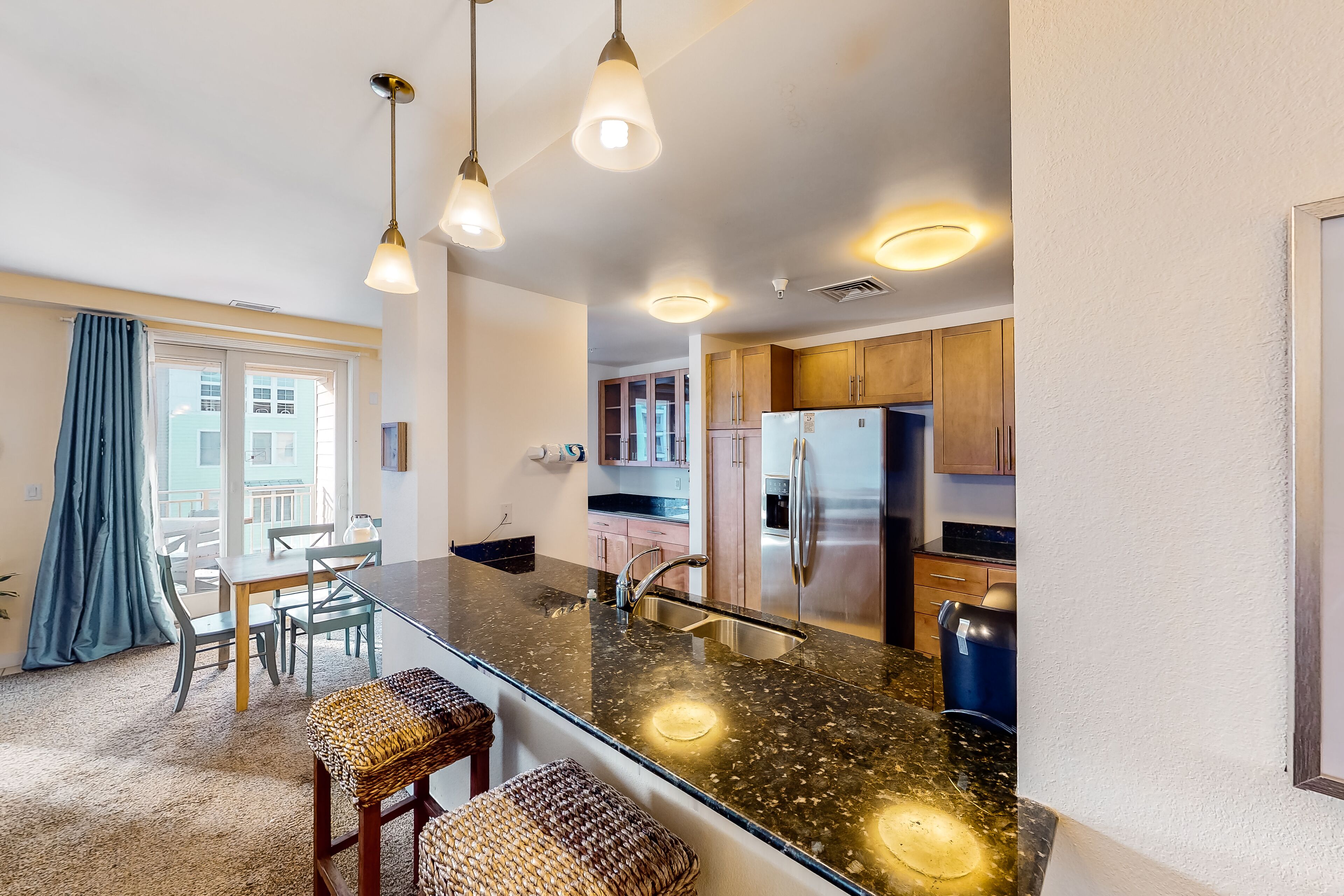 Comfortably furnished condo with glimpses of Back Bay, on-site pool & gym