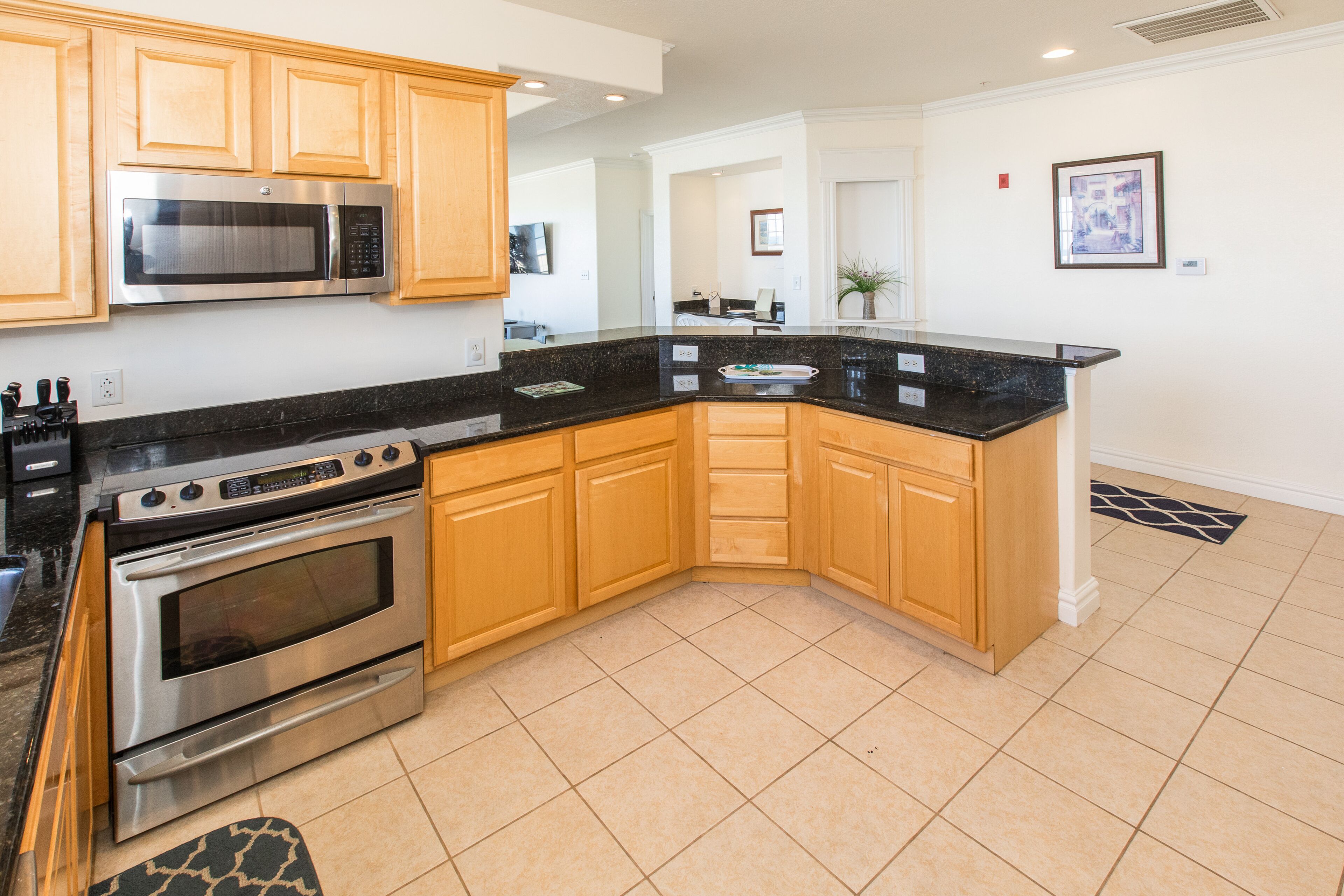 Oceanfront, corner condo with wrap-around deck, great views & on-site pool/gym