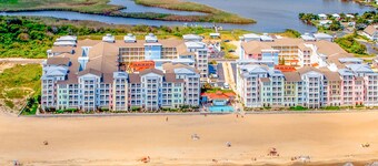 Contemporary 4th-floor ocean & bay-view retreat with outdoor pool, gym, & AC