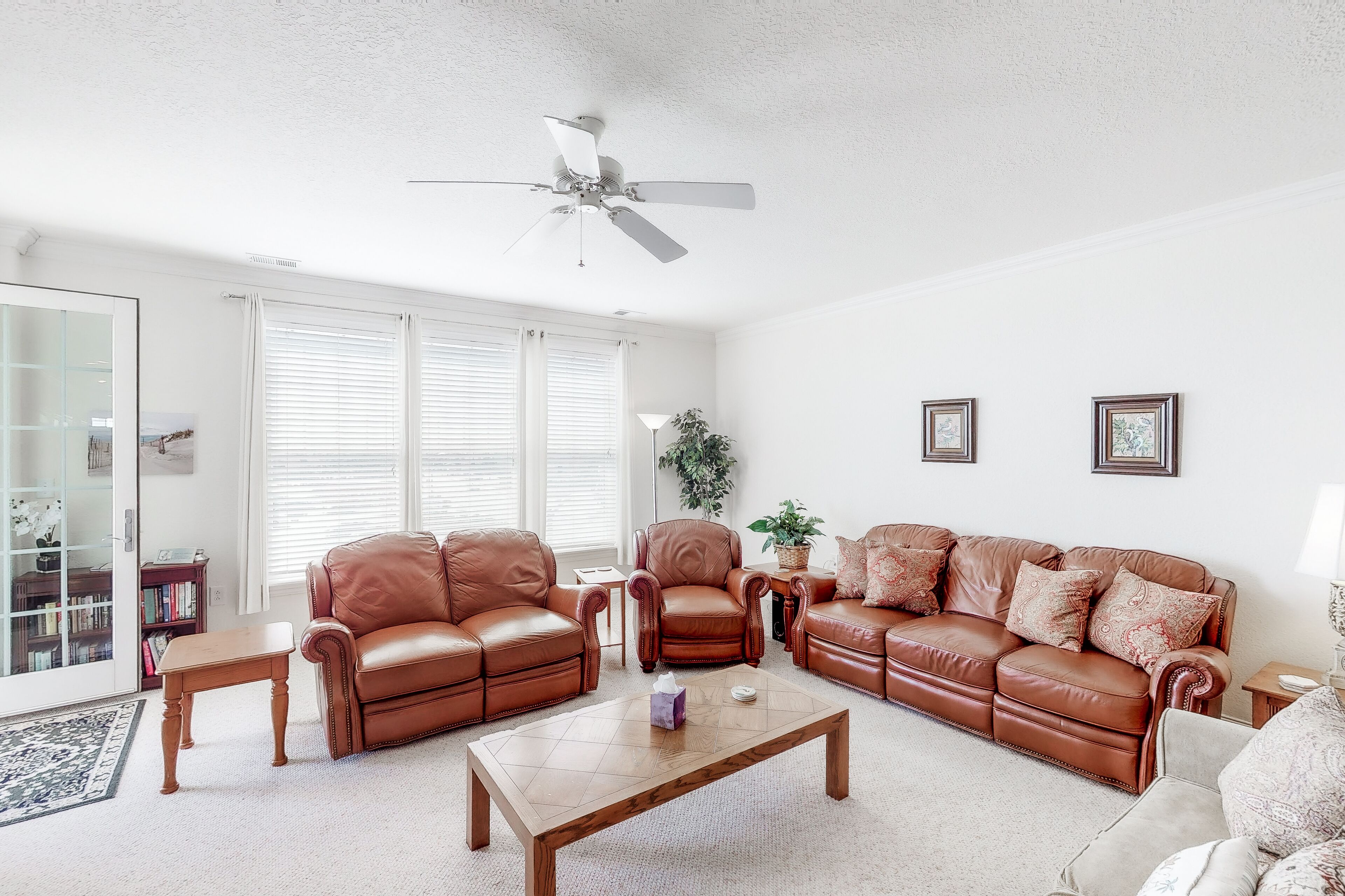 Second-floor, ocean view condo with balcony, foosball, WiFi & on-site pool/gym