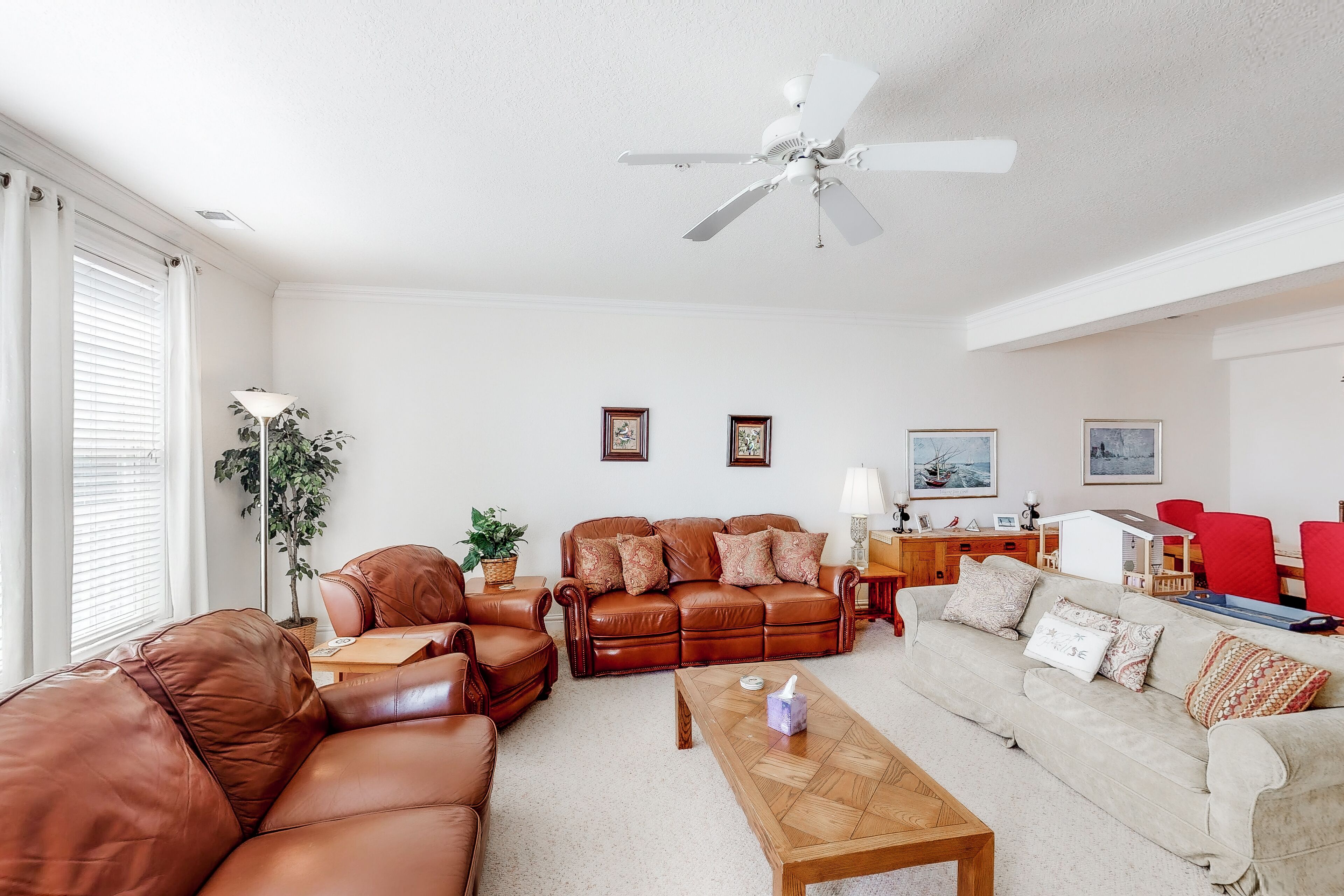 Second-floor, ocean view condo with balcony, foosball, WiFi & on-site pool/gym