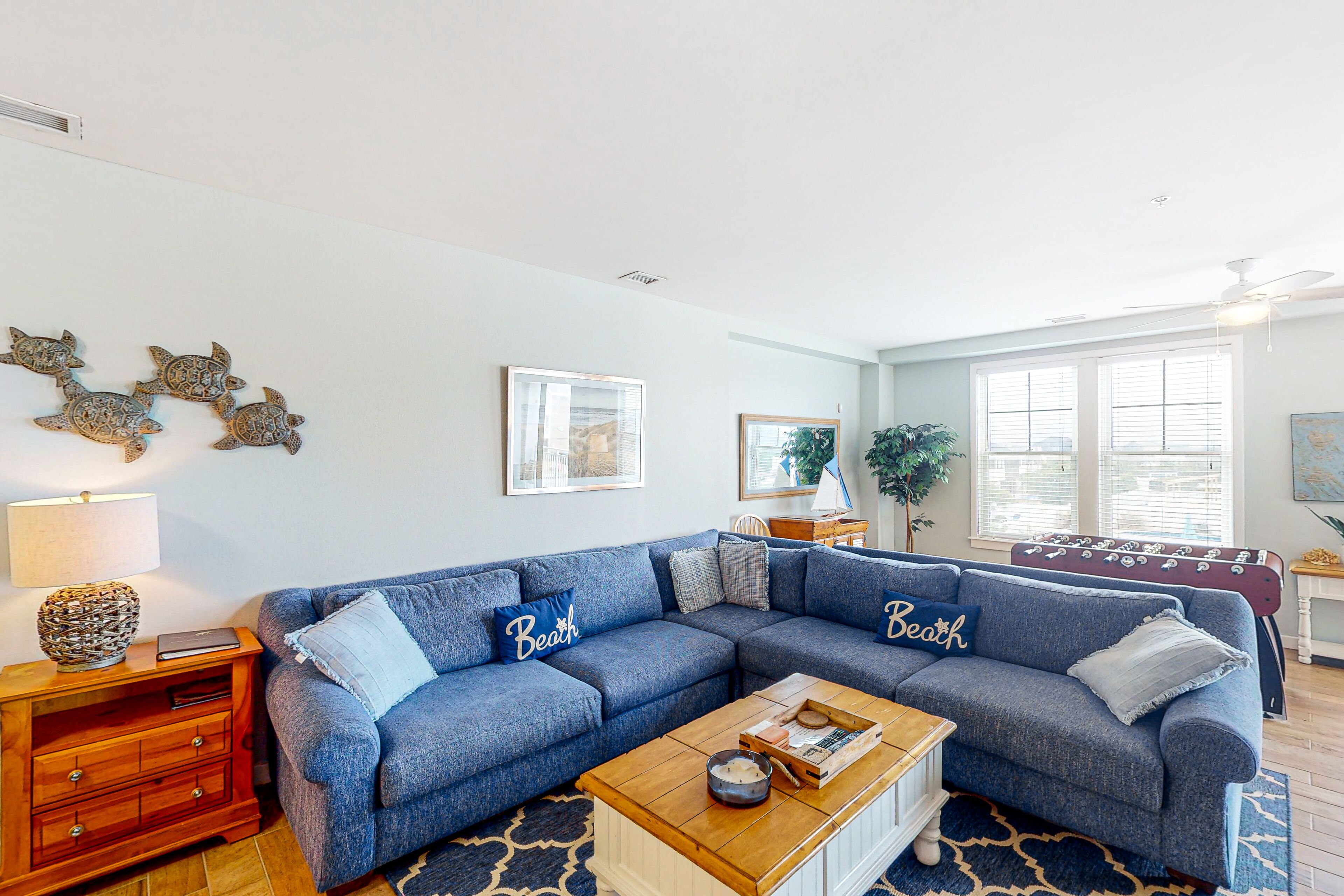 1st-floor condo near the beach with balcony, gas grills, outdoor pool & gym