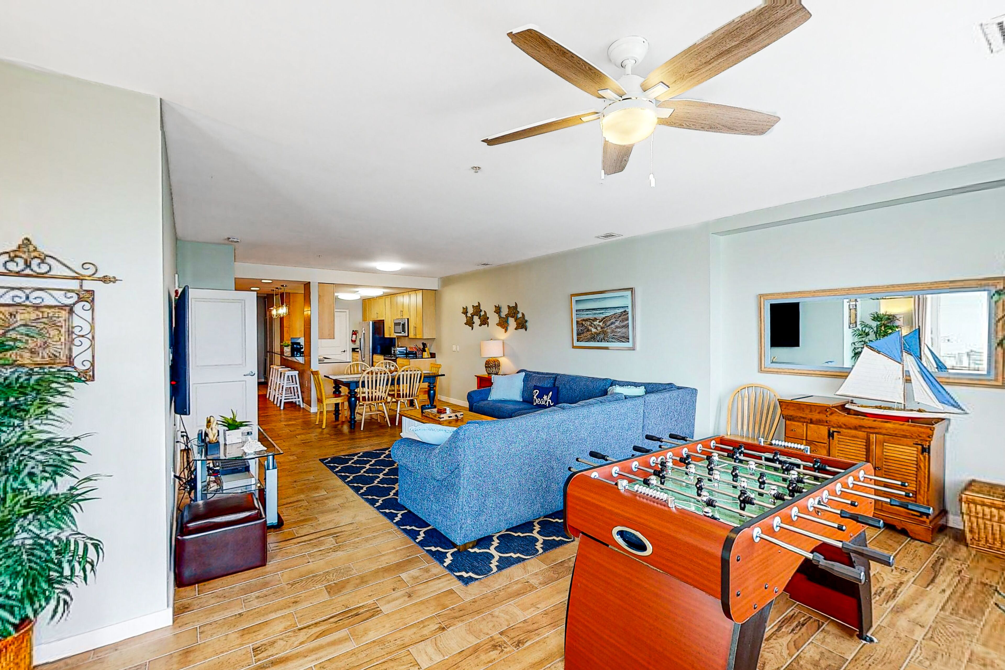 1st-floor condo near the beach with balcony, gas grills, outdoor pool & gym