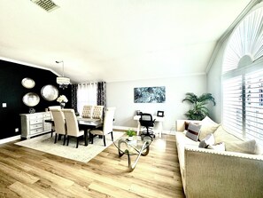 Smart TV, fireplace, books, stereo