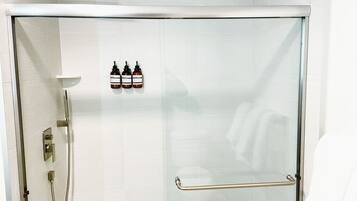 Shower, hair dryer, towels, soap