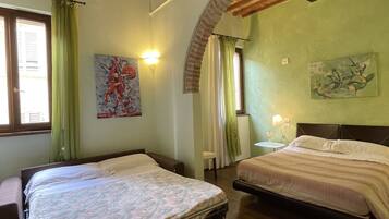 Camera Comfort | Area soggiorno | TV LED 55 pollici con canali via cavo, TV