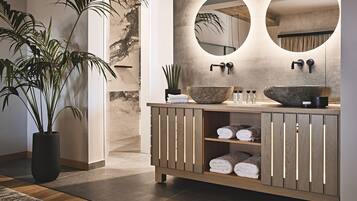 Bathtub, hair dryer, towels, soap