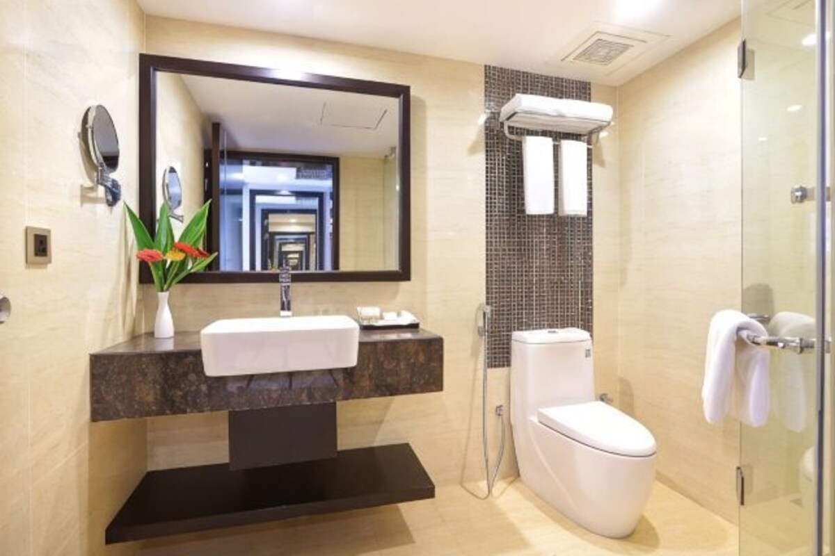 Bathroom | Designer toiletries, hair dryer (on request), slippers, towels