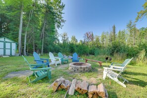 Property grounds - Houghton Lake Area Home w/ Fire Pit & Yard! (Prudenville)