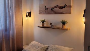 1 chambre, fer et planche Ă repasser, draps fournis