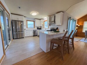 Fridge, microwave, oven, stovetop - Our Legacy - Dog Friendly Oceanside 4 BR Cottage with Community Pool access (Duck)